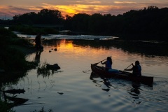 A pair of paddlers prepare to disembark on the Fox River, Yorkville