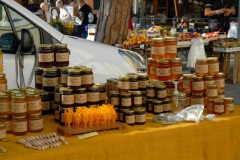 Canned goods for sale in the weekly street market in Sachille, Italy