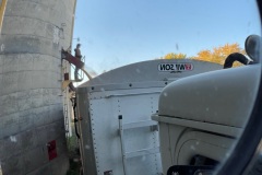 Corn is loaded out of a storage silo for transport to processor